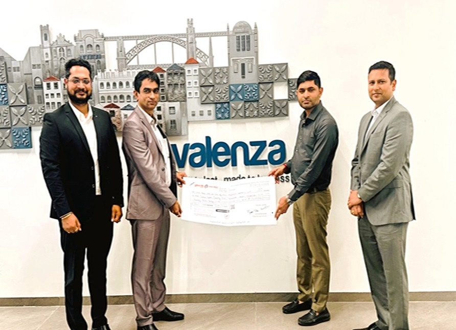 Rajkot Branch presented a claim cheque of Rs ₹ 49,02,939/- to one of its policy holders M/s VALENZA CERAMIC LLP, Morbi, Gujrat.