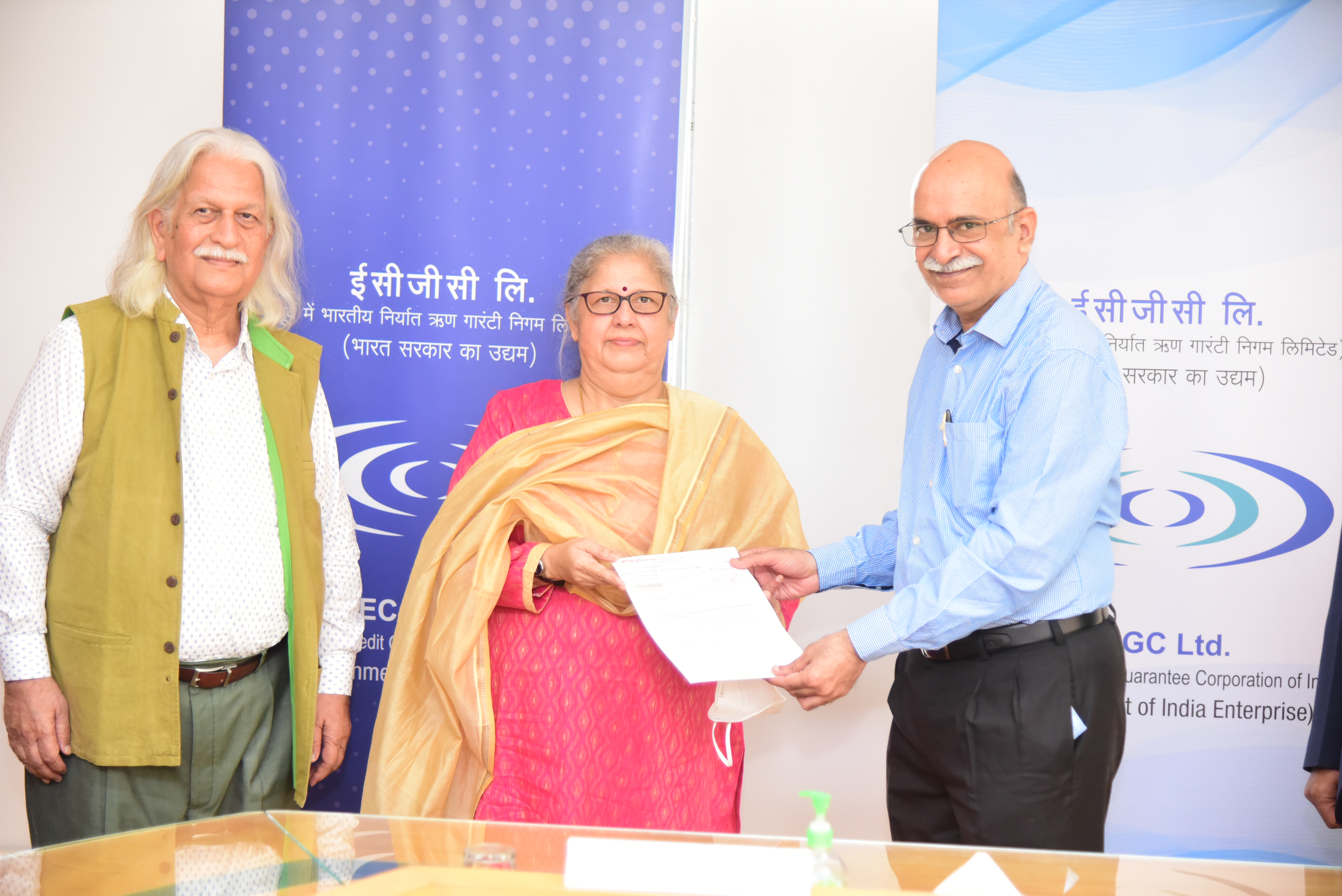 Image for Mr. M Senthilnathan handing over a cheque to Mrs. Poonam Sharma for CKS Foundation’s education initiative