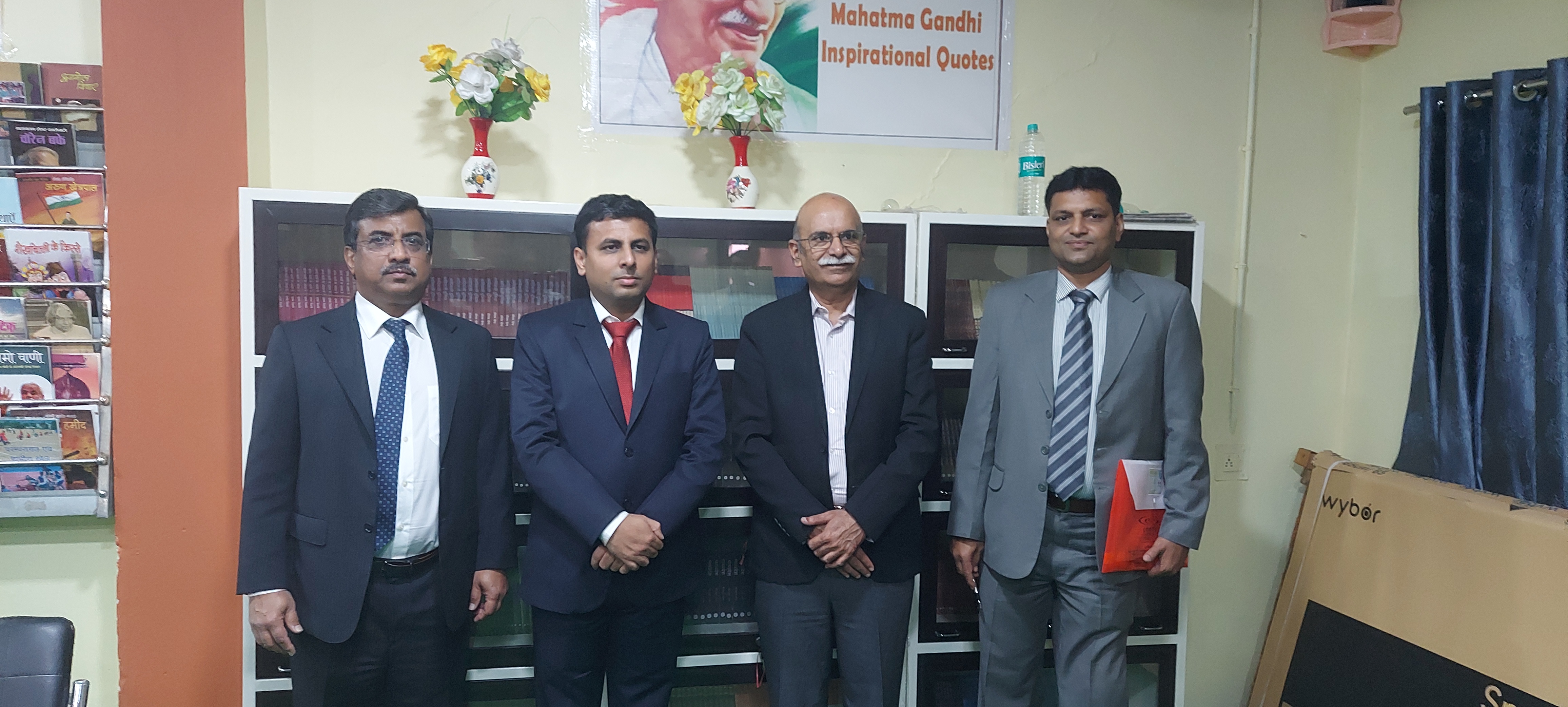 Image for Group photo of ECGC CMD, Executive Director (PM), and Indore Branch Manager during CSR visit to Rajgarh district.