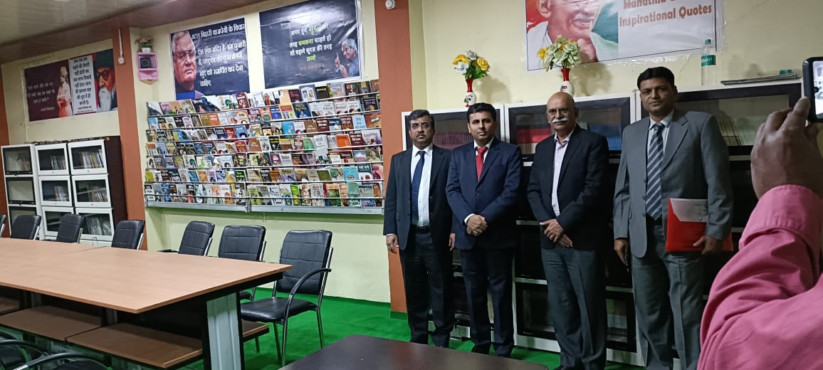 Image for Group photo of ECGC CMD, Executive Director (PM), and Indore Branch Manager during CSR visit to Rajgarh district.