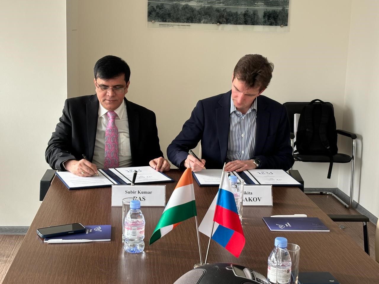 Image for Officials from ECGC Limited and EXIAR, Russia, during the signing of a Reinsurance Framework Agreement.
