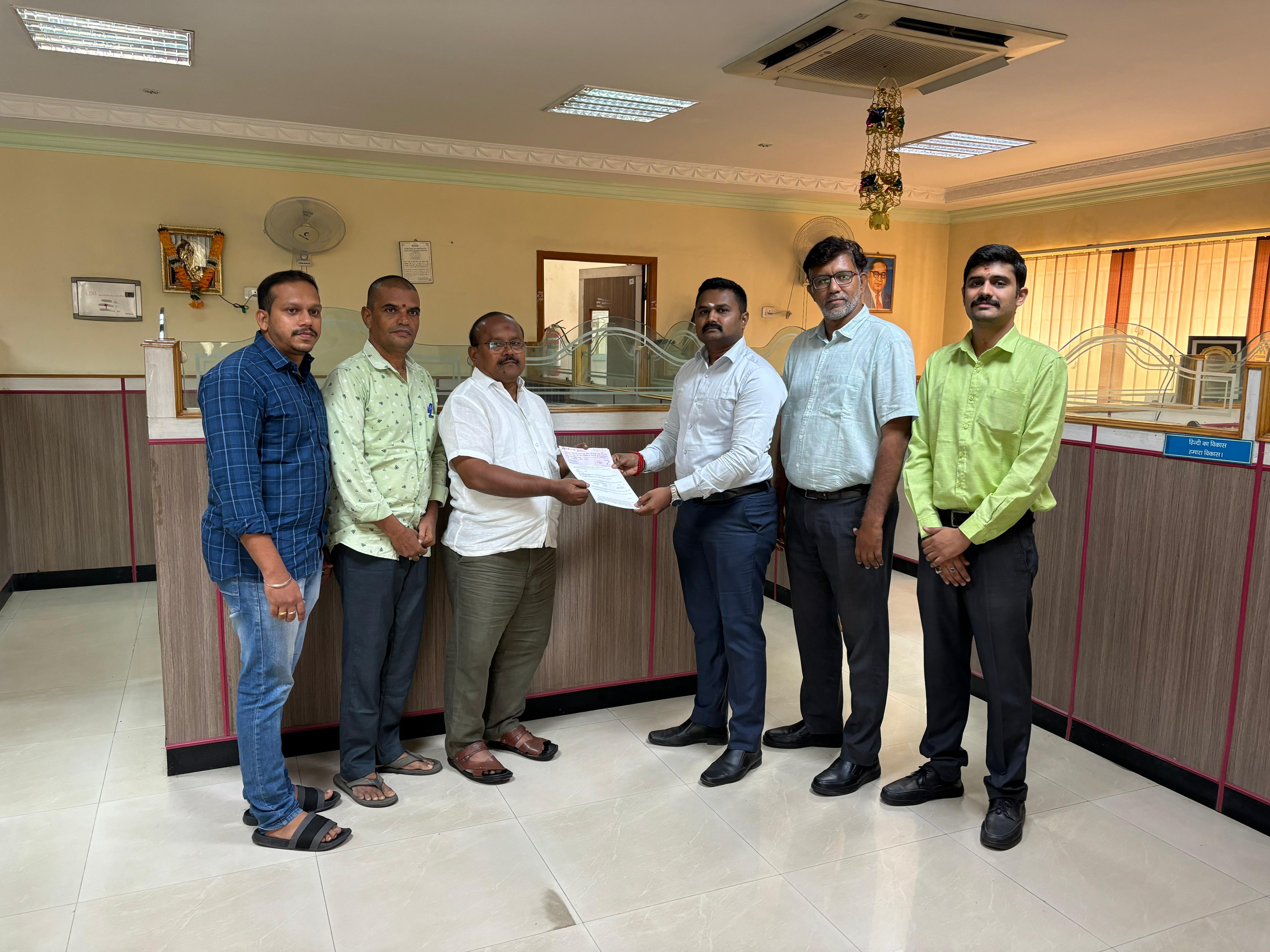 Image showing policy claim settlement certificate for Gurukarunaa Textile Mills.