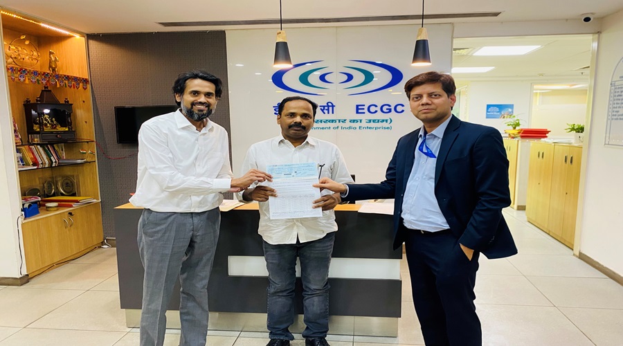 Image for Claim cheque being handed over to M/s Eastern Heritage under ST Policy due to buyer insolvency